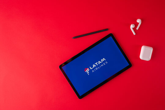 Tula, Russia - October 19, 2021: Latam Airlines Displayed Modern Laptop On Red Background