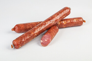 Pork ham sausage cut isolated