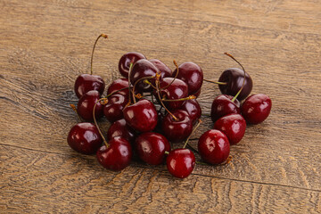 Ripe sweet cherry berries heap