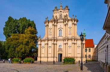 Kosciol Wizytek Visitationist Church of St. Joseph at Krakowskie Przedmiescie street in Old Town historic district of Warsaw in Poland - obrazy, fototapety, plakaty