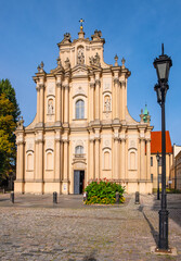 Fototapeta na wymiar Kosciol Wizytek Visitationist Church of St. Joseph at Krakowskie Przedmiescie street in Old Town historic district of Warsaw in Poland