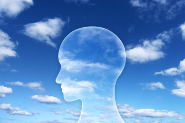 Mind and feeling concept. Person head silhouette and blue sky.