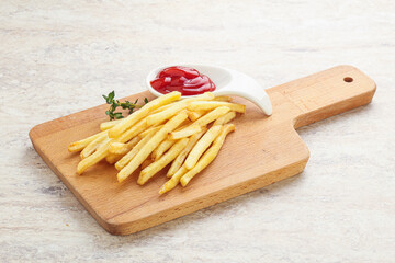 French fried potato over board