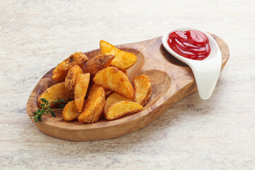 Fried rustic potato with tomato ketcup