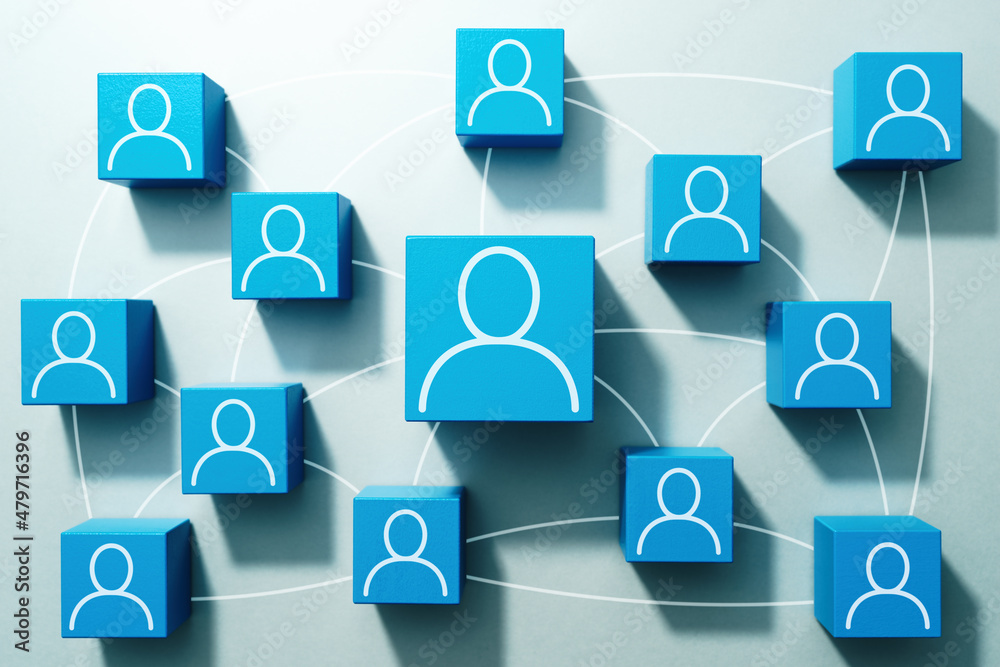 Poster people online network and communication concept. top view of many wood cubes with people icons.