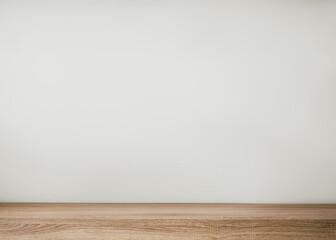 Empty wood table top and blur wall. Wall Texture Background. Building banner mock up abstract background - can used for display or montage your products.