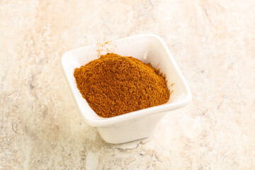 Dry Paprika powder in the bowl