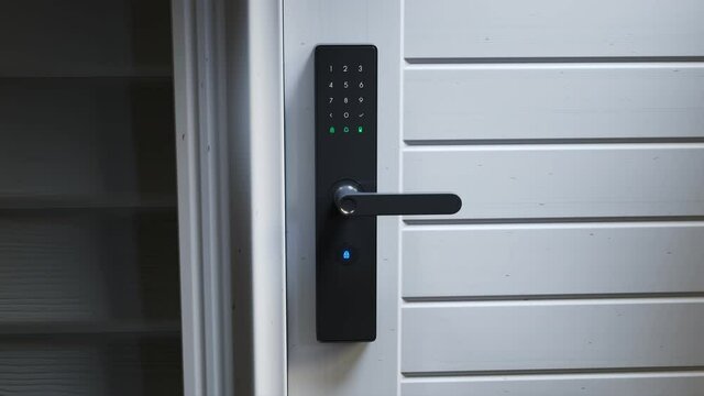 Smart door lock. Home security. No keys system. The handle opens with password.