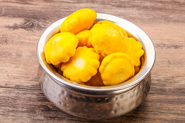 Marinated patissons in the bowl