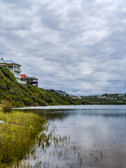 Fototapeta na wymiar kleinemonde beach front and houses on the river bank in Port Alfred South Africa