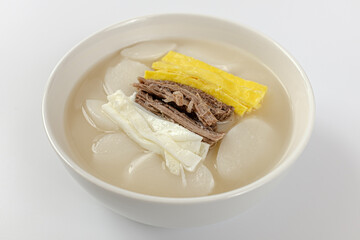 Rice cake soup on a white background