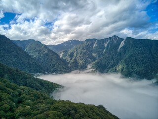 Fototapeta na wymiar sea of clouds on the top of mountain