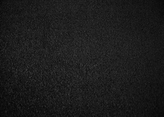 Fototapeta premium Black indoor office carpet texture. High resolution seamless monochrome wool fabric background. Interior material background top view. Short pile carpet. Blank generic microfiber textile texture.