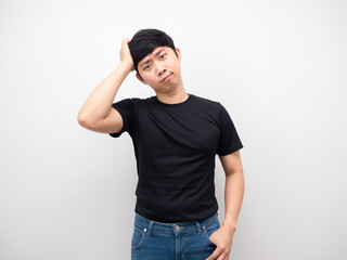 Asian man with jeans gesture touch his head