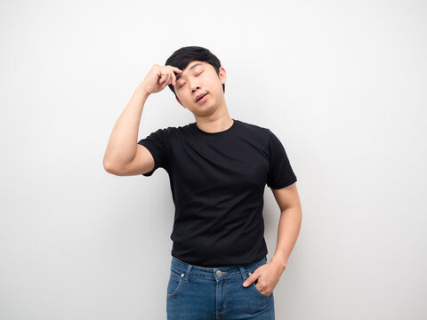 Asian man with jeans gesture touch his head