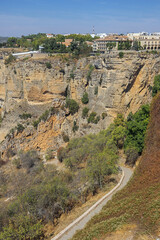 Fototapeta na wymiar Looking over the precipice of the Guadalevin river to the northern part of Ronda
