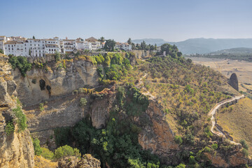 Looking at the southern part of Ronda over the precipice of the Guadalevin river, seen from the la Sevillana vantage point