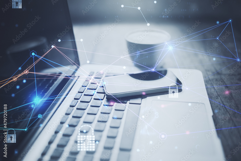 Poster Close up of laptop and other items on desktop with abstract coding interface, glowing digital lines on blurry background. Information, technology, network and security concept. Double exposure.