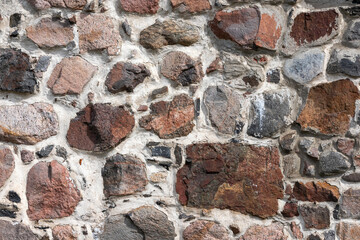 Old stone wall, close up background photo