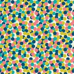 Simple seamless polka dot pattern in bright colors.