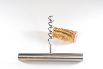corkscrew and cork isolated on white background