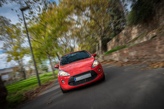 Small red brand city utility car fast and dynemic