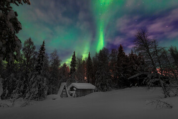 Northern Lights from the view of a cabin