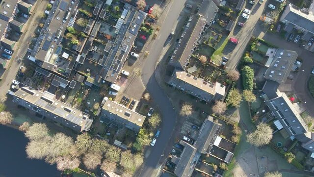 Top down aerial of a beautiful and calm suburban neighborhood in the Netherlands