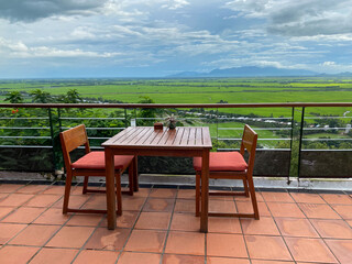 Fototapeta premium Wooden table and chairs at the coffee shop