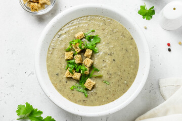 mushroom soup in a bowl. Top view,copy space.