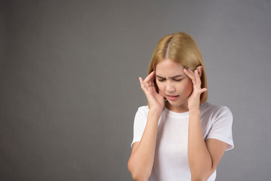 portrait of short blonde hair woman stressed and depressed in studio