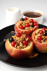 Concept of tasty food with baked apples, close up