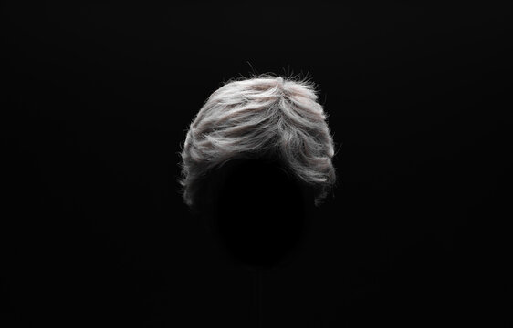 white wig on black background