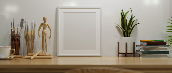 Minimal white empty frame mockup on wooden tabletop