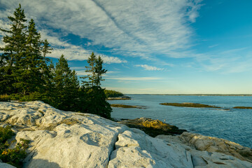 Atlantic coastline at sunset. Deserted rocky coast. USA. Maine  © Ann Stryzhekin