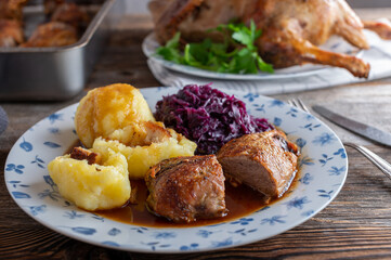 Duck breast with potato dumplings, red cabbage and gravy