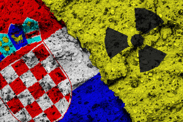 Concept of the Nuclear Energy Policy of Croatia with a flag and a radiation hazard sign painted on...