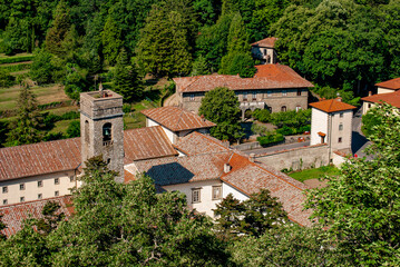 Fototapeta na wymiar Aerial view of the Abbey of Vallombrosa, surrounded by forests of beech and founded in 11th century by Giovanni Gualberto, in the province of Florence, Italy. 