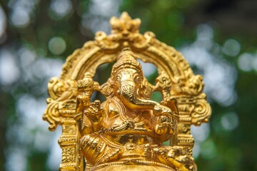 golden statue of lord ganesh