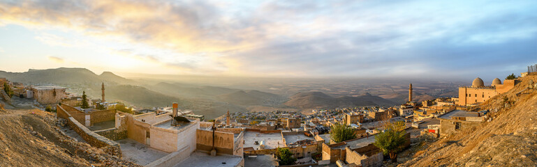 Panorama of the old city of Mardin, Turkey at sunrise. Cityscape view to the minaret of the Grand...