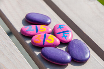 Homemade domino game with pebbles