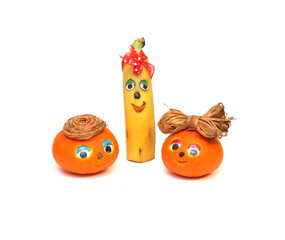 Orange. Banana. cheerful round orange with eyes, nose and mouth, on an isolated white background. carving for oranges and fruits. place for text.