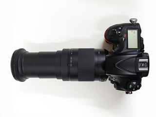 Digital camera with lens, professional isolated on white