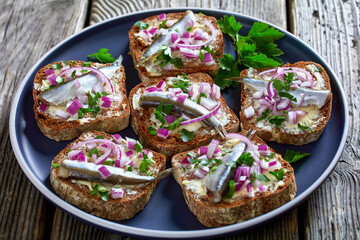 pickled sprat rye bread open sandwiches, top view