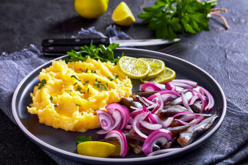 sprat red onion and pickles salad with potato mash