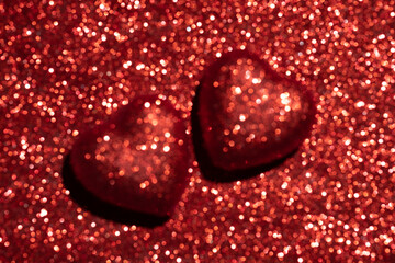 Red festive sparkling background. Backdrop for Valentine's Day.