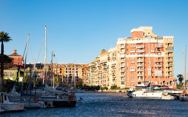Fototapeta premium VALENCIA , SPAIN - DECEMBER 8, 2021: traditional buildings of Port Saplaya the Little Venice near Valencia Spain