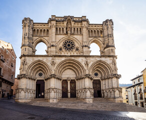 Fototapeta na wymiar Facade of the medieval cathedral in gothic style at Cuenca in Castilla La Mancha, Spain