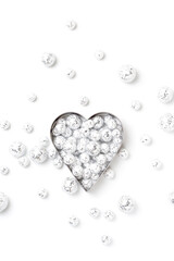 Saint Valentine`s day greeting card,  heart symbol in silver glitter balls