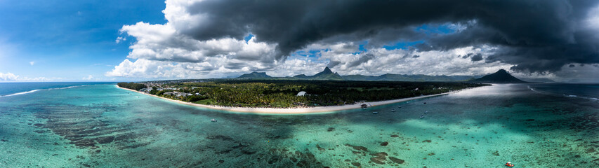 Aerial view, The beach at Flic en Flac with luxury hotel La Pirogue Resort & Spa and palm trees, , Mauritius, Africa,